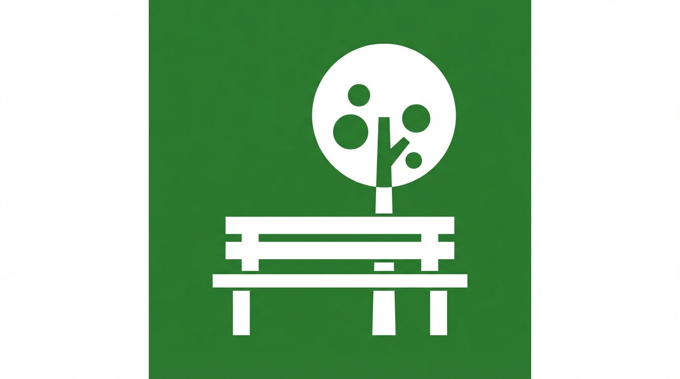 Pictogramme d'un banc de parc sous un arbre représentant la signalisation d'espaces publics municipaux
